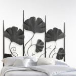Cabecero de forja Palmeira con diseño floral de hojas metálicas en dormitorio elegante